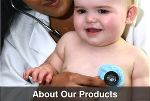 A doctor listens to a young baby using a stethoscope covered with StethoBarrier disposable stethoscope covers.